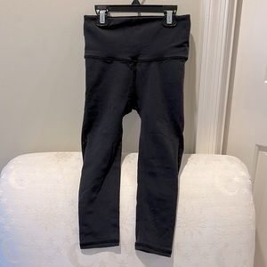 Lululemon crop leggings, with cutout detail. Size 2